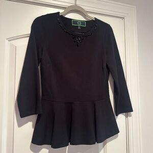 Black top with detail neck and ruffle